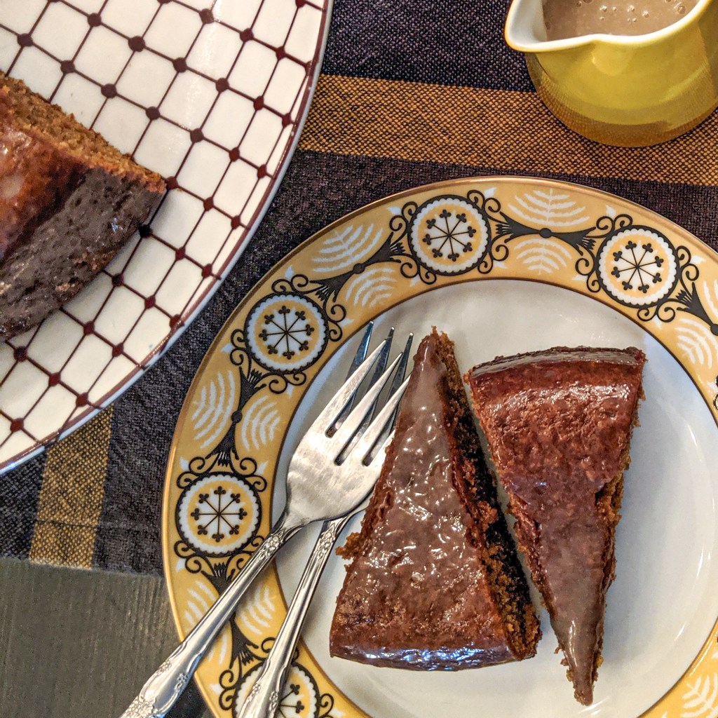 Molasses cake with sauce on the side