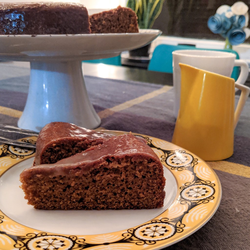 Molasses cake with sauce on the side